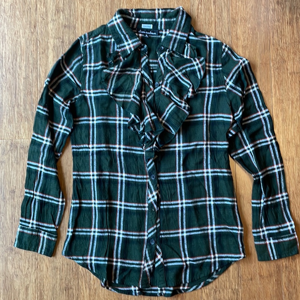 Dark olive green with red and white plaid detail with ruffle front.